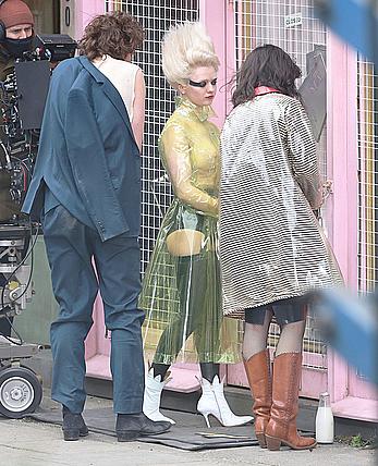 Maisie Williams in see through blouse on the set of Pistol in London