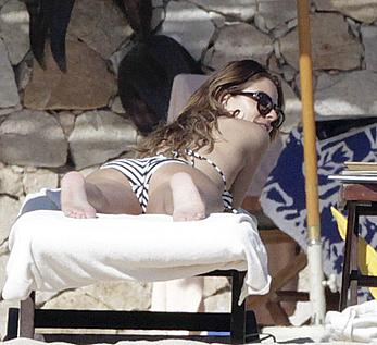 Maria Menounos in bikini poolside paparazzi shots