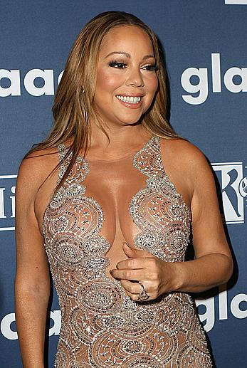 Mariah Carey posing in see through dress at 27th GLAAD Media Awards