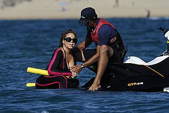 Mariah Carey boobslip wearing a wetsuit in Italy