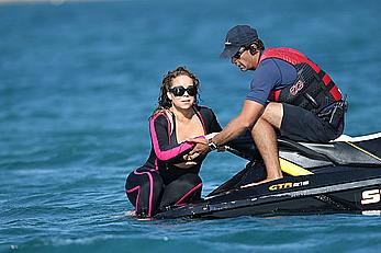 Mariah Carey boobslip wearing a wetsuit in Italy