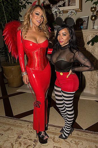 Mariah Carey in tight red dress at her Halloween Party in Los Angeles