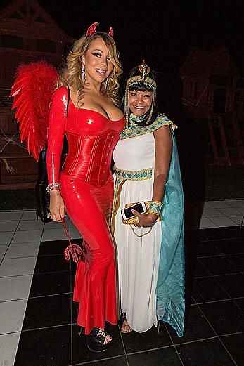 Mariah Carey in tight red dress at her Halloween Party in Los Angeles