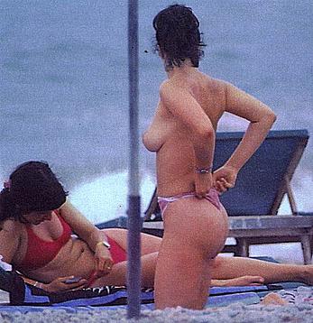 Maribel Verdu caught topless on a beach