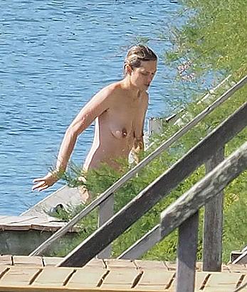 Marion Cotillard swimming fully nude in the ocean in Cap-Ferret