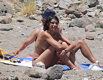 Marta Fernandez caught topless on a beach