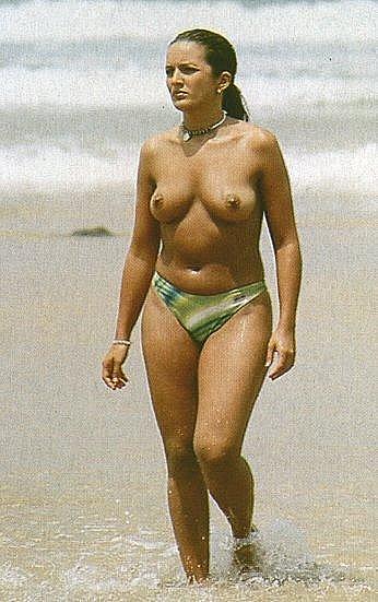 Marta Lopez topless on a beach paparazzi photos