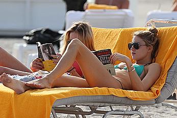 Martha Hunt sunbathing in bikini at the beach in Miami