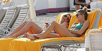 Martha Hunt sunbathing in bikini at the beach in Miami