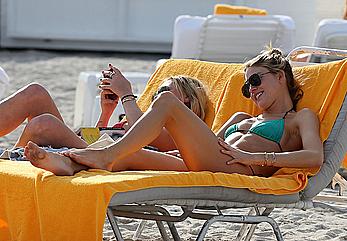 Martha Hunt sunbathing in bikini at the beach in Miami