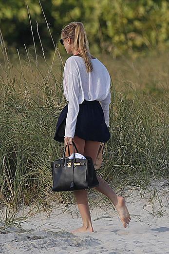 Supermodel Maryna Linchuk in pink bikini at the beach in Miami