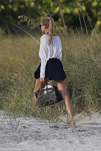 Supermodel Maryna Linchuk in pink bikini at the beach in Miami