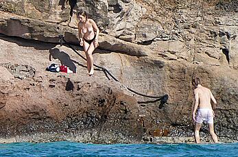 Maya Hawke topless on a beach at St. Barts with her mom Uma Thurman