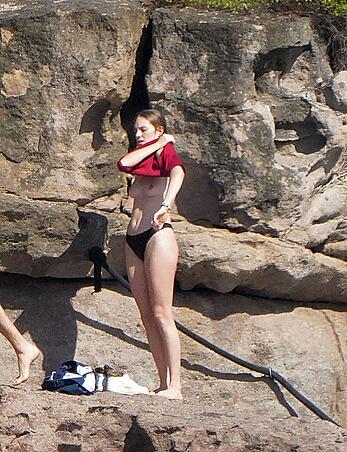 Maya Hawke topless on a beach at St. Barts with her mom Uma Thurman