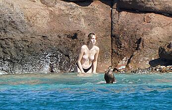 Maya Hawke topless on a beach at St. Barts with her mom Uma Thurman