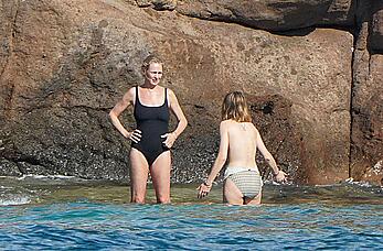 Maya Hawke topless on a beach at St. Barts with her mom Uma Thurman