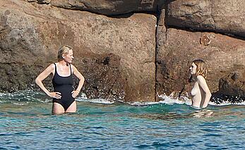 Maya Hawke topless on a beach at St. Barts with her mom Uma Thurman