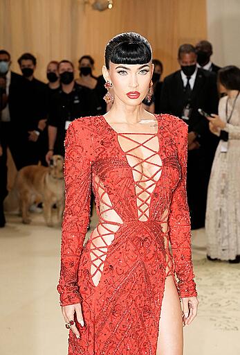 Megan Fox sexy legs and cleavage at the Met Gala in New York