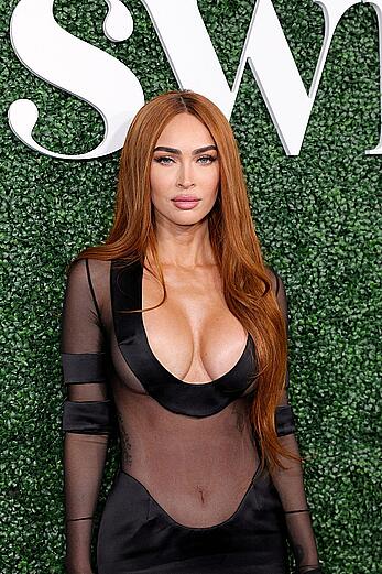 Megan Fox deep cleavage at the Sports Illustrated swimsuit launch event in New York