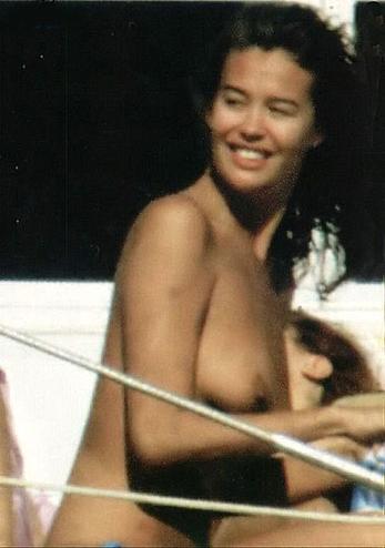 Megan Gale sunbathing topless on a yacht