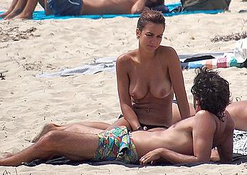 Spanish actress and former model Megan Montaner topless on a beach