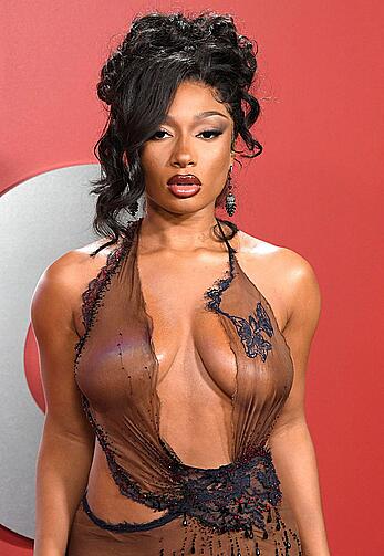 Megan Thee Stallion in see through dress at GQ's Men of the Year Awards Party