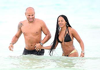 Melanie Brown in bikini candids on the beach in Mexico