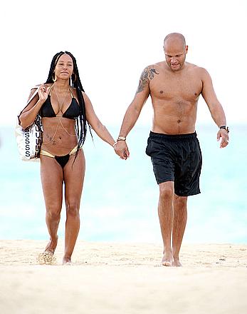 Melanie Brown in bikini candids on the beach in Mexico