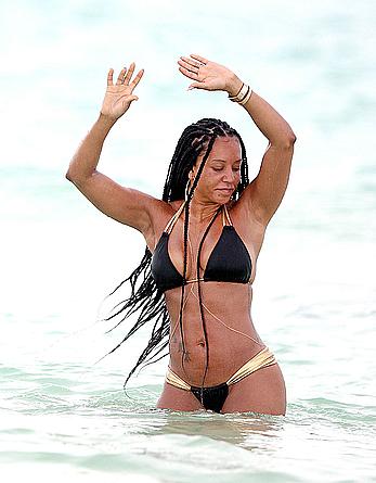 Melanie Brown in bikini candids on the beach in Mexico