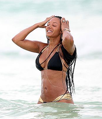 Melanie Brown in bikini candids on the beach in Mexico