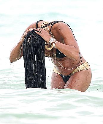 Melanie Brown in bikini candids on the beach in Mexico