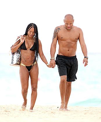 Melanie Brown in bikini candids on the beach in Mexico