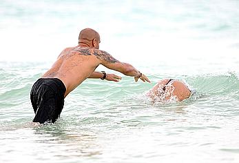 Melanie Brown in bikini candids on the beach in Mexico