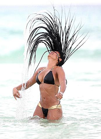 Melanie Brown in bikini candids on the beach in Mexico