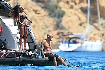 Melanie Brown in black bikini & hard nipples In ibiza