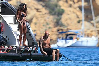 Melanie Brown in black bikini & hard nipples In ibiza