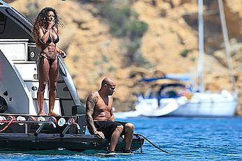 Melanie Brown in black bikini & hard nipples In ibiza