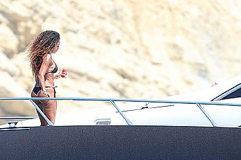 Melanie Brown in black bikini & hard nipples In ibiza