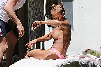 Melanie Brown topless at a resort in California