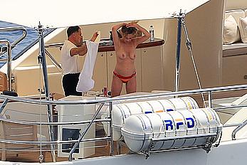 Melanie Griffith topless goes for a massage aboard a Yatch in Ibiza