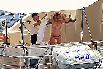 Melanie Griffith topless goes for a massage aboard a Yatch in Ibiza