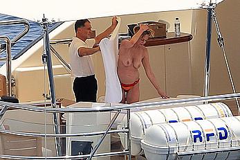 Melanie Griffith topless goes for a massage aboard a Yatch in Ibiza