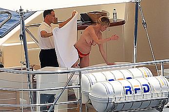 Melanie Griffith topless goes for a massage aboard a Yatch in Ibiza