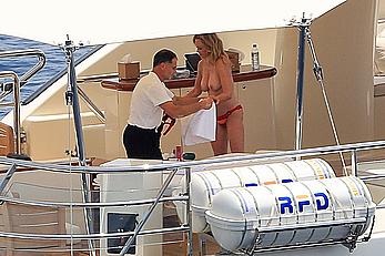 Melanie Griffith topless goes for a massage aboard a Yatch in Ibiza