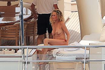 Melanie Griffith topless goes for a massage aboard a Yatch in Ibiza