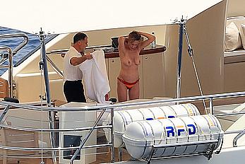 Melanie Griffith topless goes for a massage aboard a Yatch in Ibiza