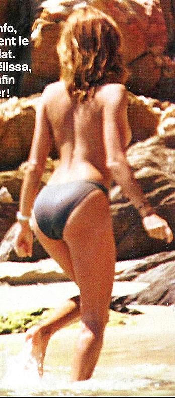 Melissa Theuriau sunbathing topless paparazzi shots