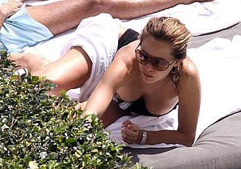 Melissa Theuriau shows her great nude tits poolside