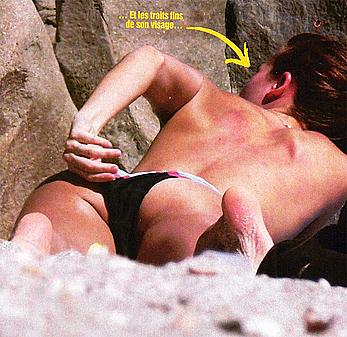 Melissa Theuriau sunbathing topless paparazzi shots