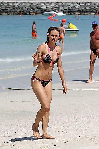 Michelle Hunziker in bikini at a beach